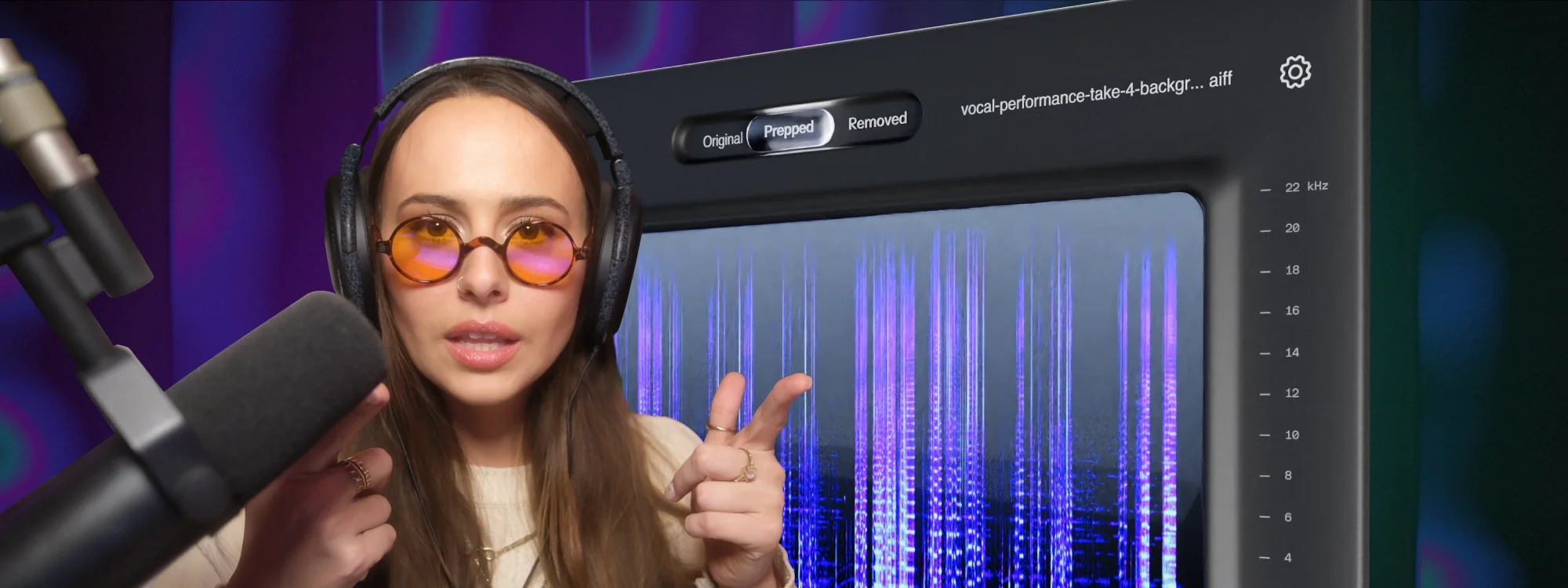 A woman wearing headphones and speaking into a microphone in front of the Vocal prep interface