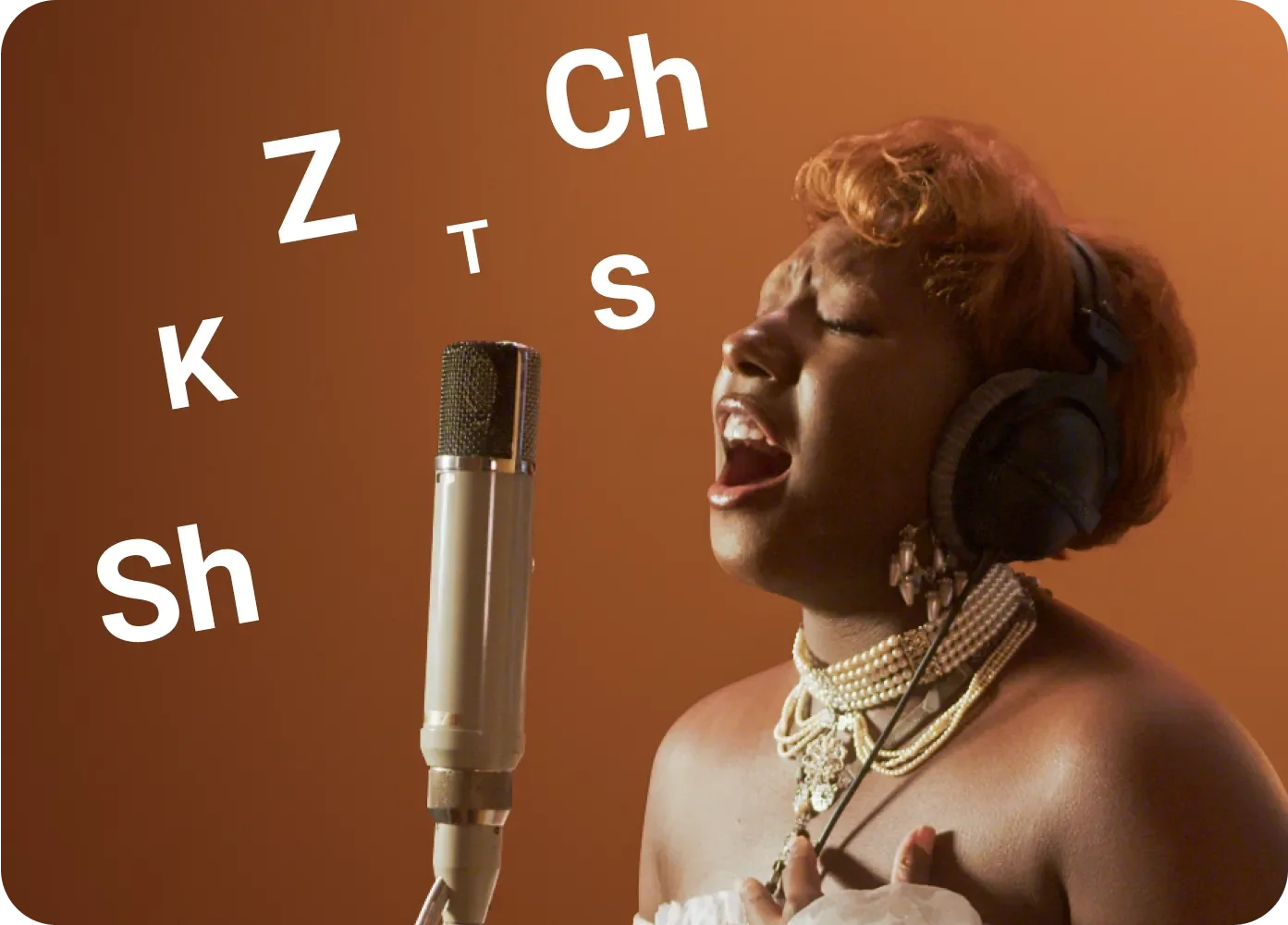 A female singing into a microphone