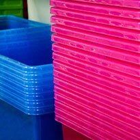 Pink and blue bins stacked.