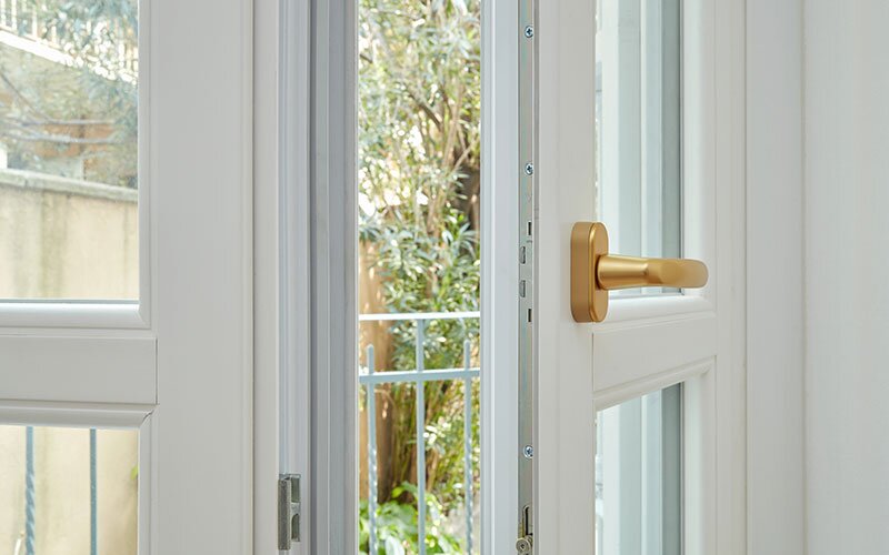 A patio door open slightly.