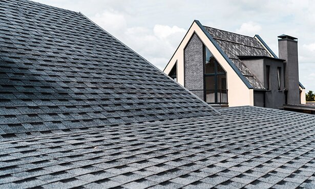 Asphalt roof shingles on a home.