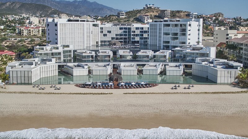 The pool at Montage Los Cabos surround by desert landscaping.
