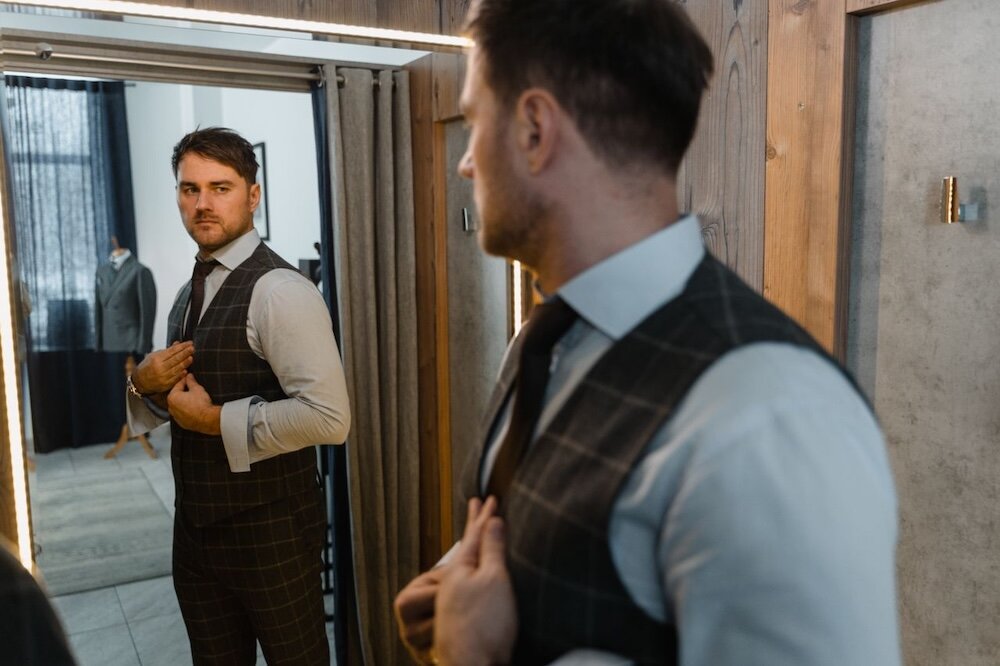 Person looking at self in mirror