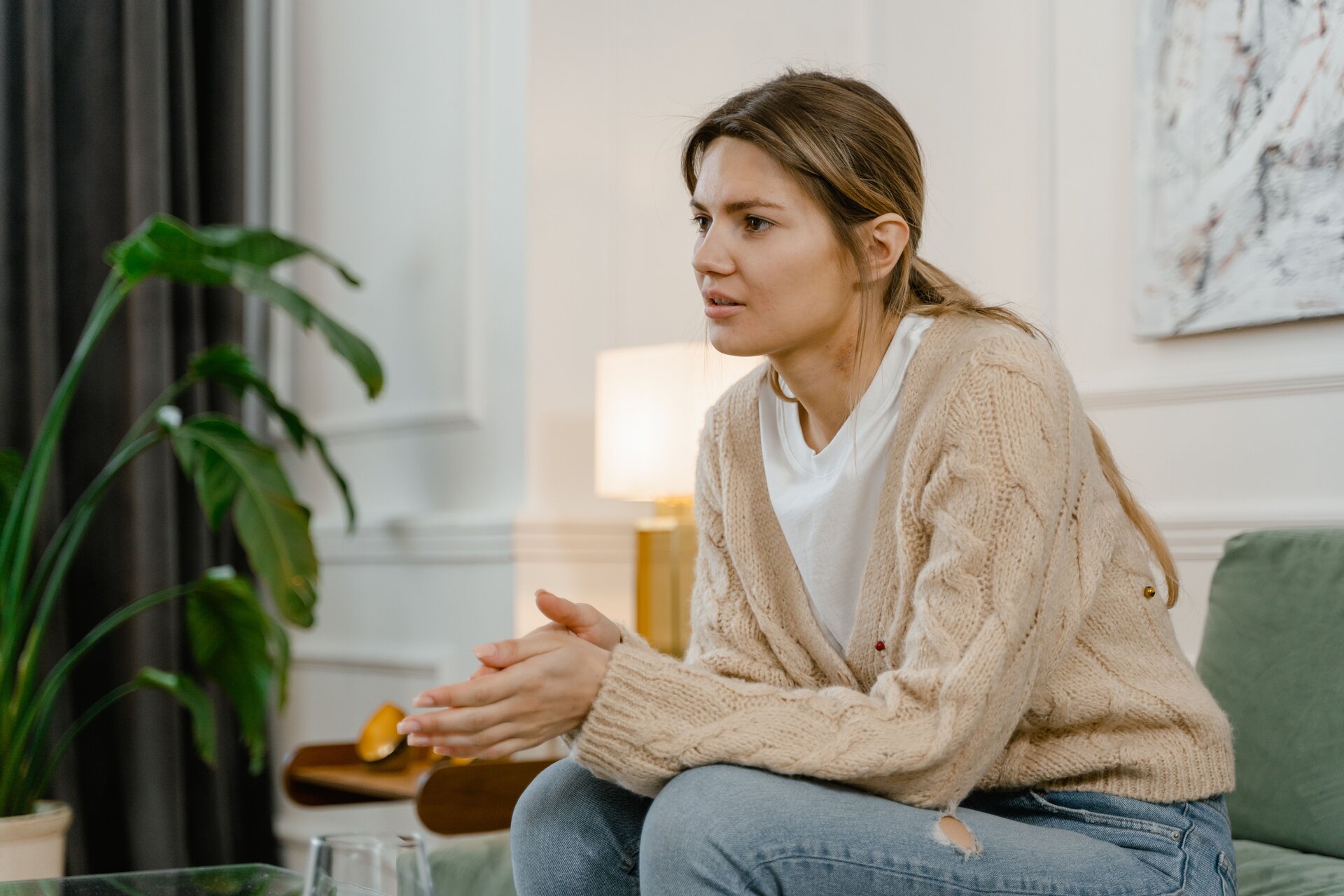 Woman sitting and thinking deeply