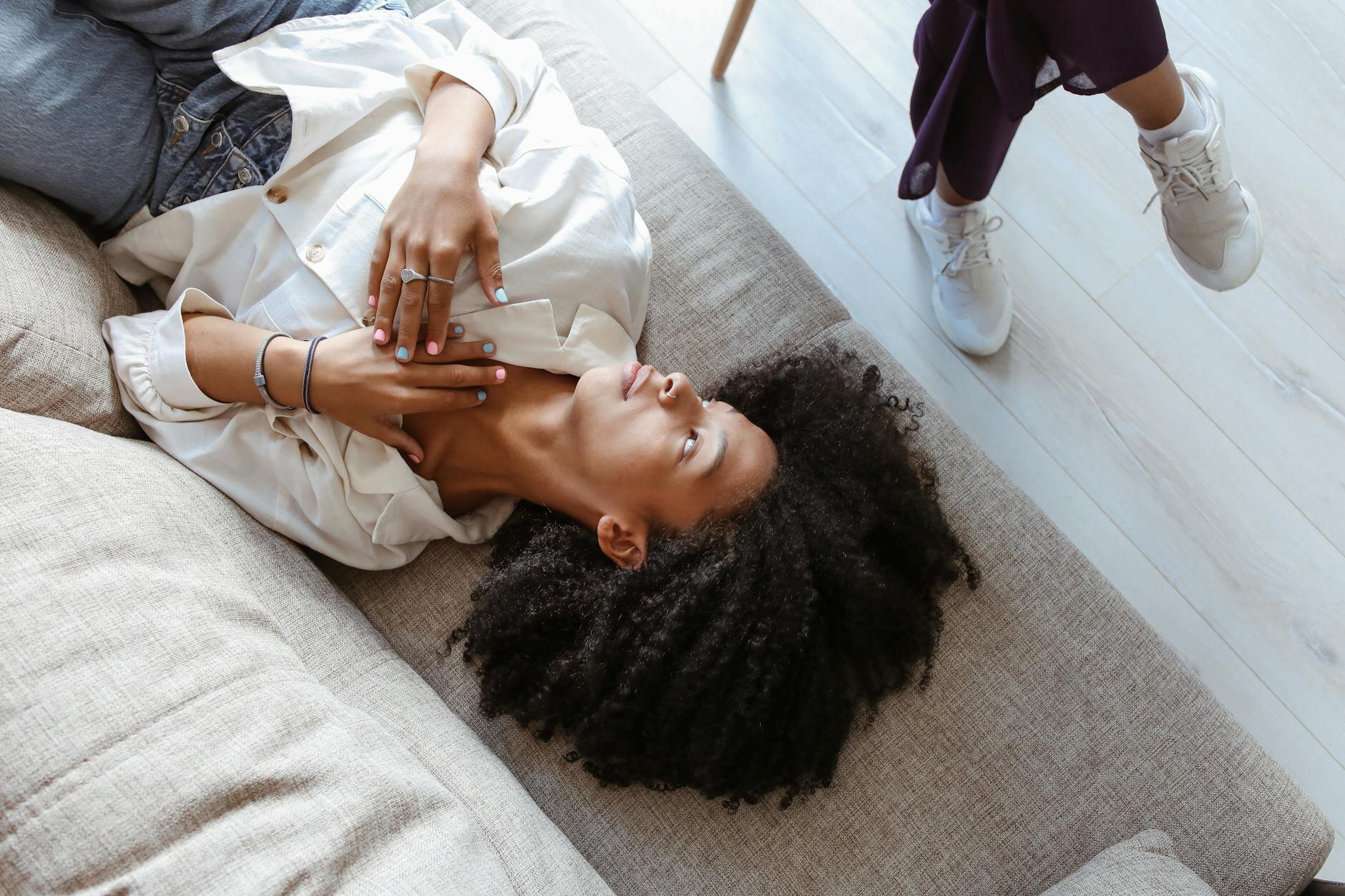 Woman pensively thinking about therapy