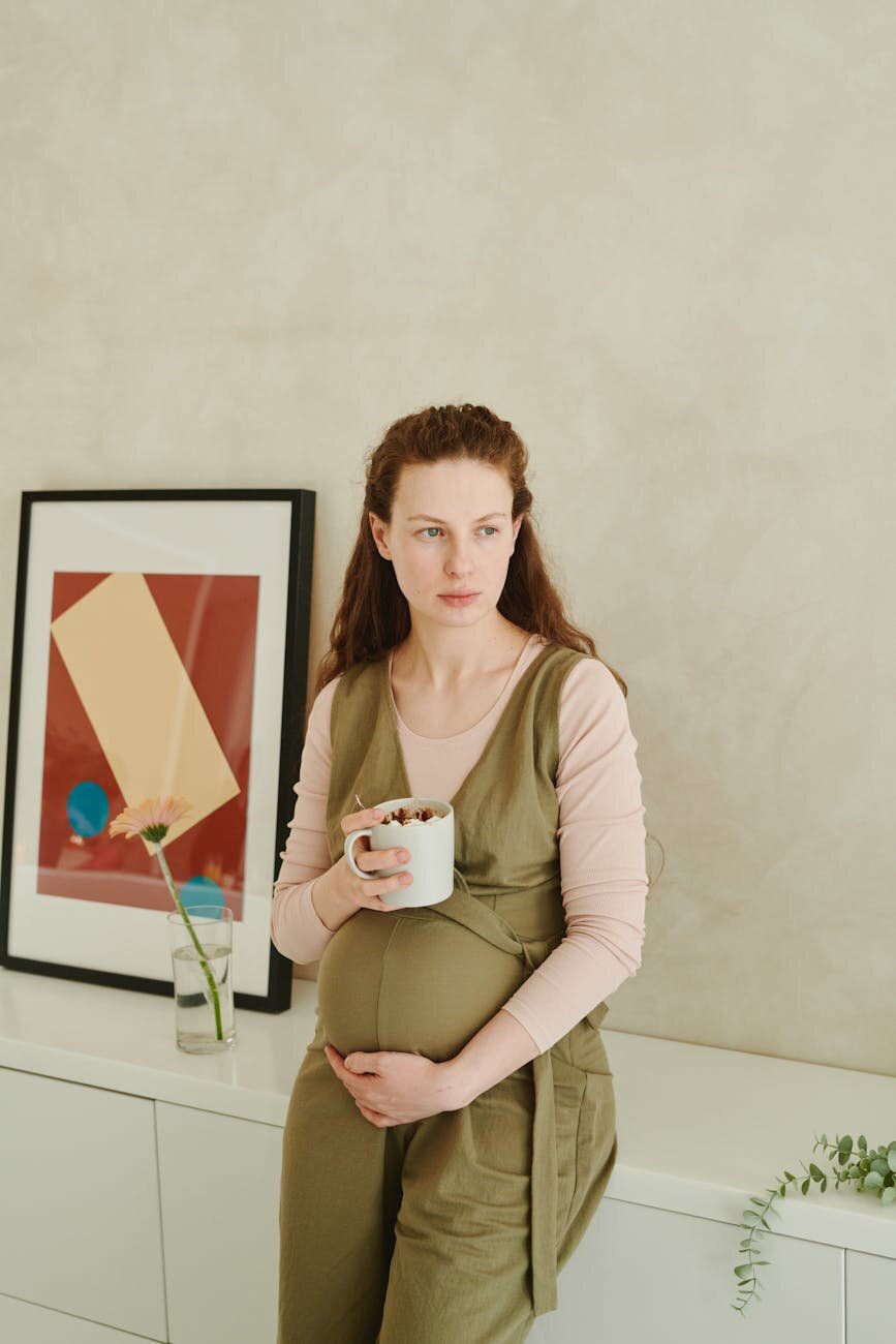 Pregnant woman thinking seriously