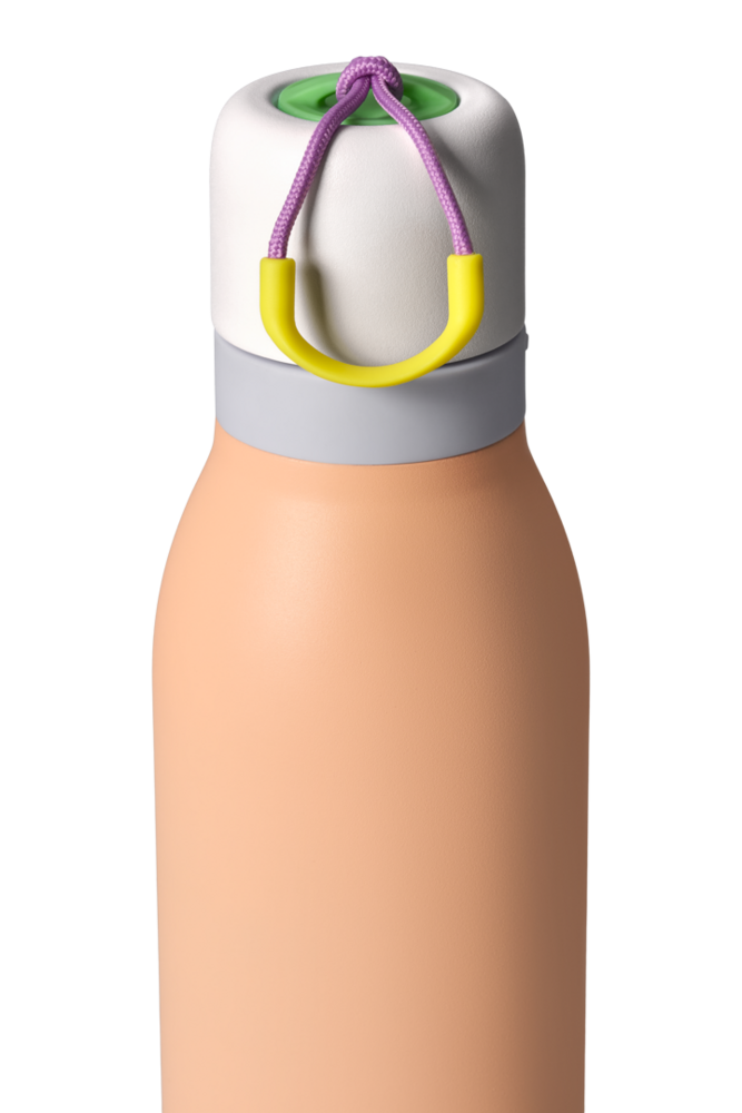 Owala FreeSip Twist 18oz in Peachy Keen, close-up of twist cap and carry string showing peach body, white twist cap with gray accent band, purple carry string, and yellow carry string grip