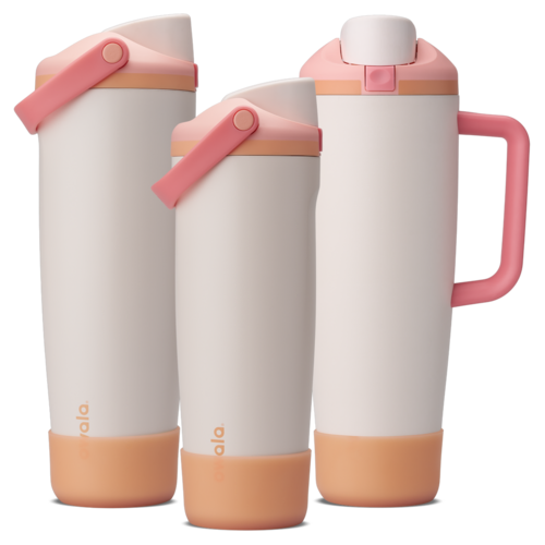 Bottle Boot for FreeSip Tumbler and Sway in translucent orange silicone, shown on three Sparkling Sherbet bottles from left to right: 30oz FreeSip Sway, 40oz FreeSip Sway, and 40oz FreeSip Tumbler with handle, all with cream bodies and peach accents