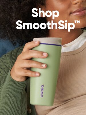 A woman holding an Owala SmoothSip coffee mug. Shop SmoothSip