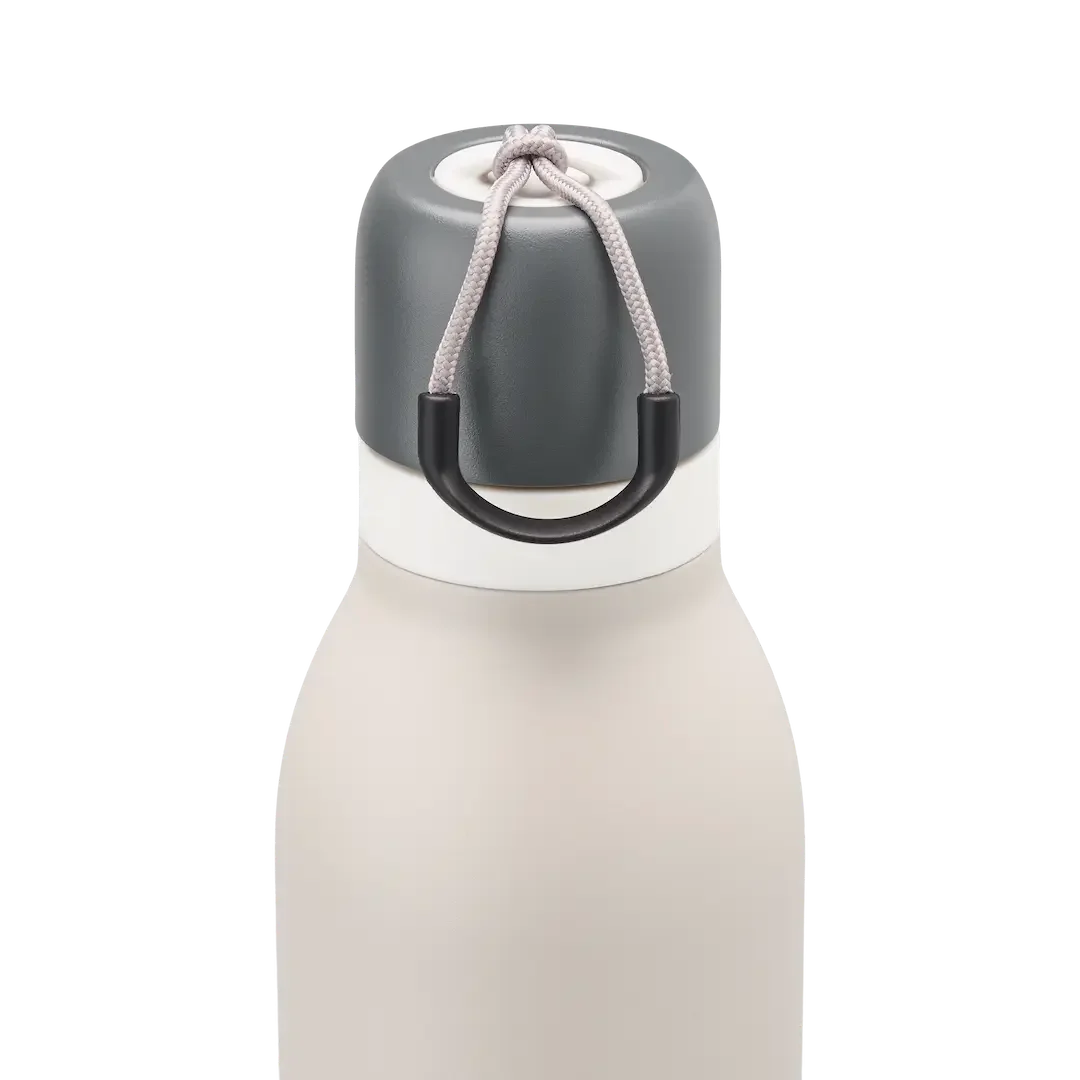 Owala FreeSip Twist 24oz in Rock On, close-up of twist cap and carry string showing off-white cream body, dark gray twist cap with white accent band, light gray carry string, and black carry string grip