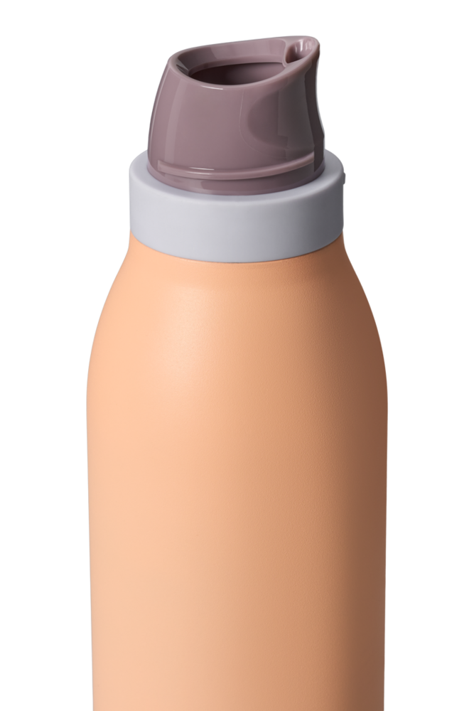 Owala FreeSip Twist 18oz in Peachy Keen, close-up of lid area with twist cap removed showing mauve FreeSip spout, peach body and gray accent band