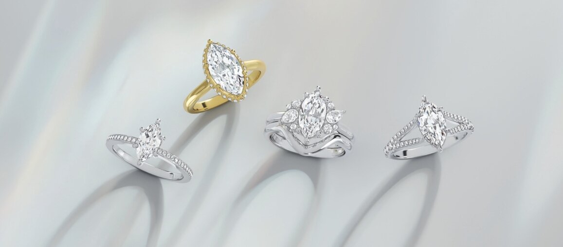 Marquise cut diamond engagement rings in yellow and white gold featuring halo, solitaire, and pavé band designs