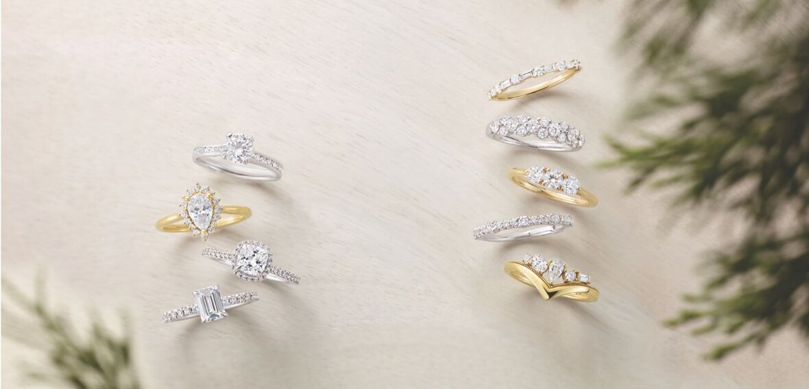 Elegant gold engagement ring with diamond pavé band stacked with matching wedding bands by Wedding Bands & Co., Chicago custom jeweler