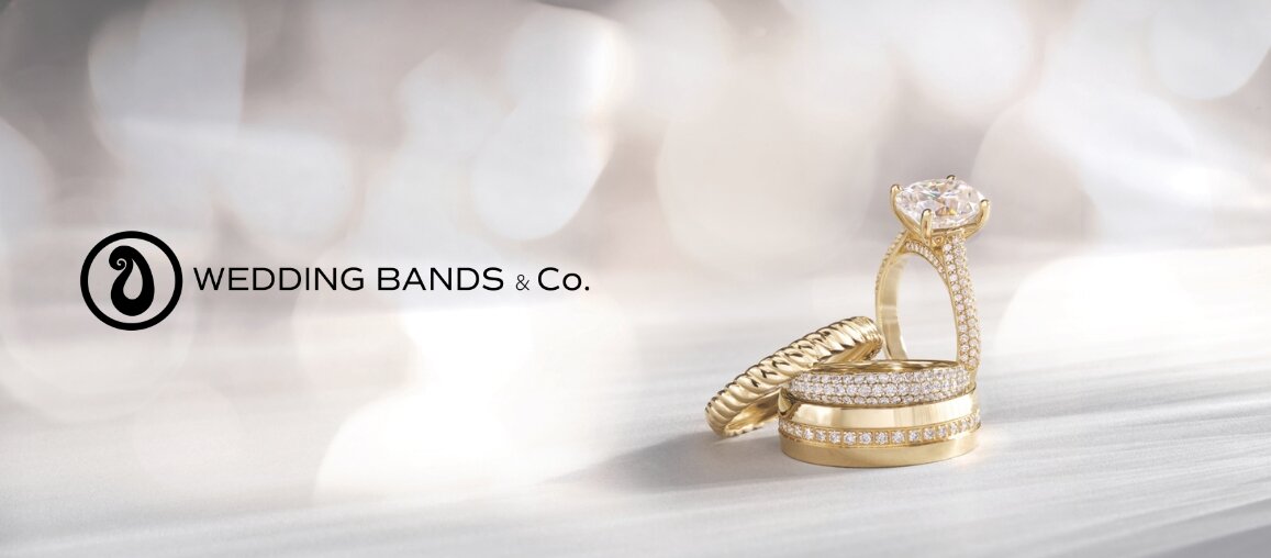 Elegant gold engagement ring with diamond pavé band stacked with matching wedding bands by Wedding Bands & Co., Chicago custom jeweler