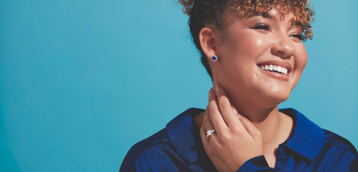 White and yellow gold diamond wedding bands styled on lace fabric, showcasing elegant bridal ring designs by Wedding Bands & Co. in Chicago