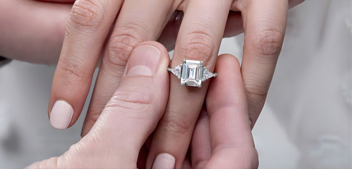 Gold engagement ring with pavé diamond band stacked with wedding bands for recreation or redesign