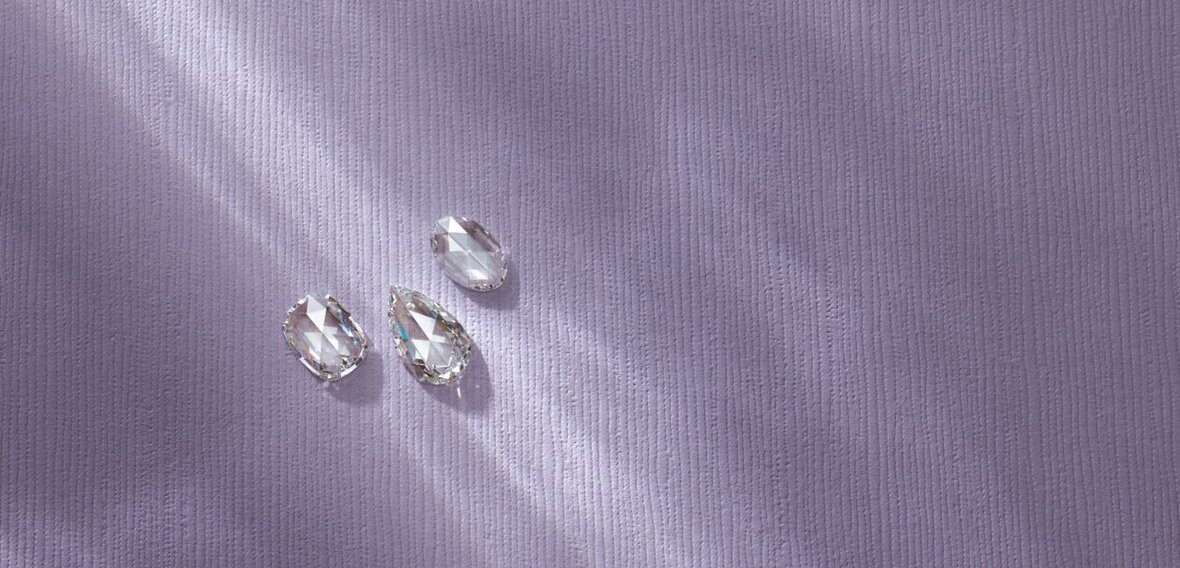 Elegant gold engagement ring with diamond pavé band stacked with matching wedding bands by Wedding Bands & Co., Chicago custom jeweler