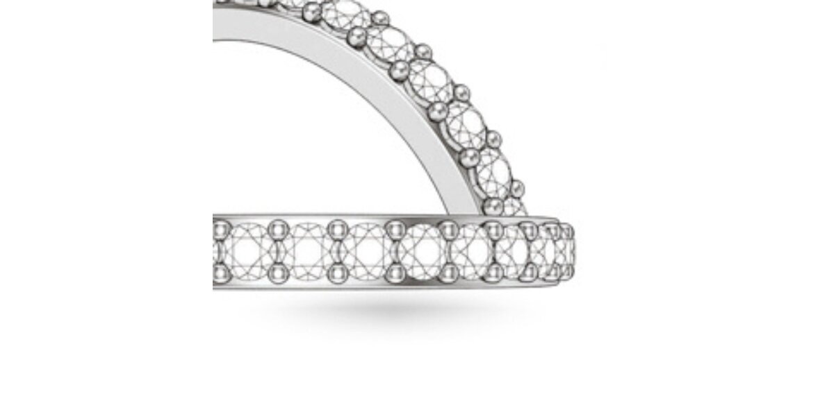 Engagement ring with pavé-set diamonds held by shared small prongs