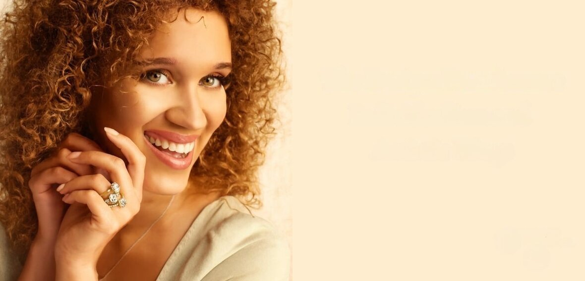 White and yellow gold diamond engagement rings showcasing artistic Renaissance-era design elements