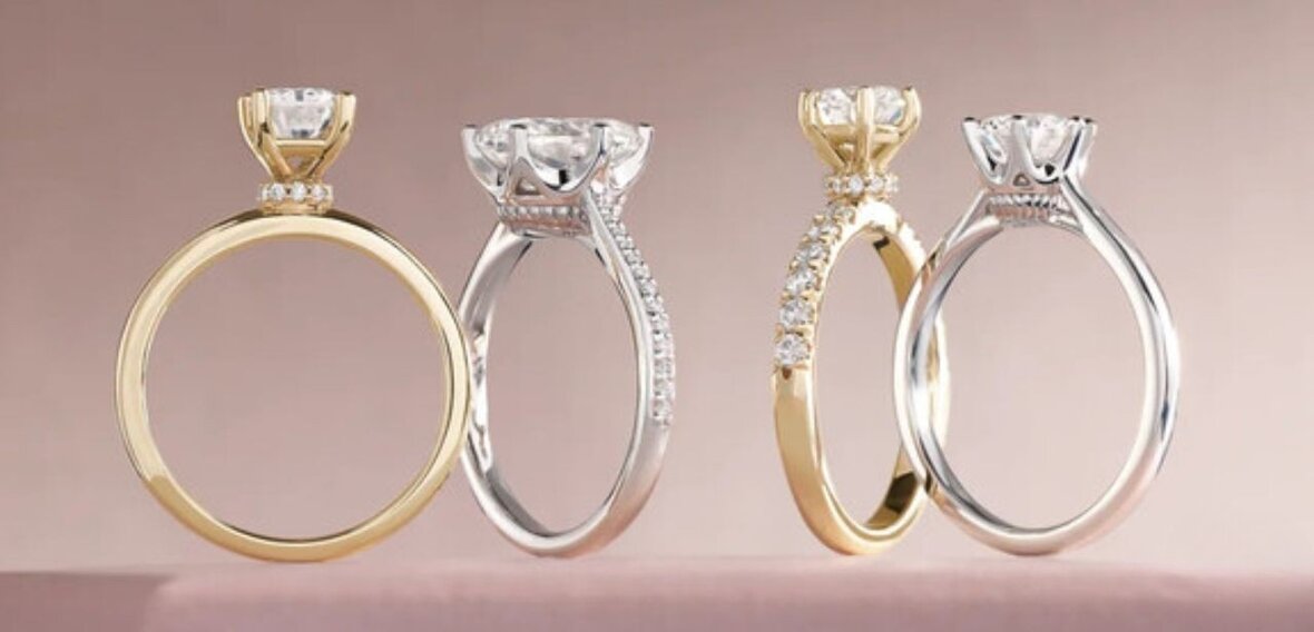 Platinum engagement ring with crisscrossing diamond and plain bands, a custom design detail
