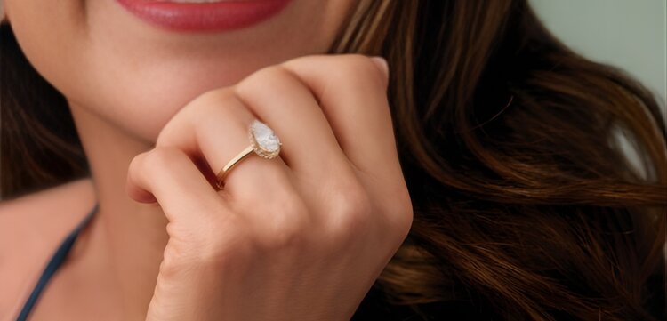 Side-by-side comparison of engagement ring appraisal certificate and GIA diamond grading report