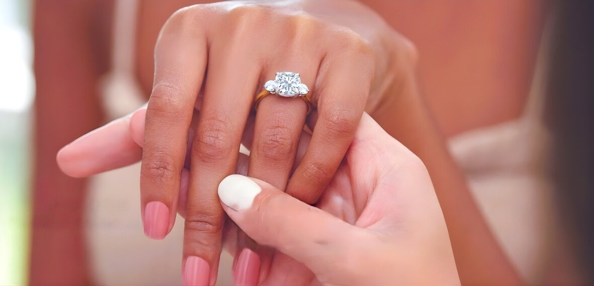 White and yellow gold diamond wedding bands on lace fabric showing various replacement styles