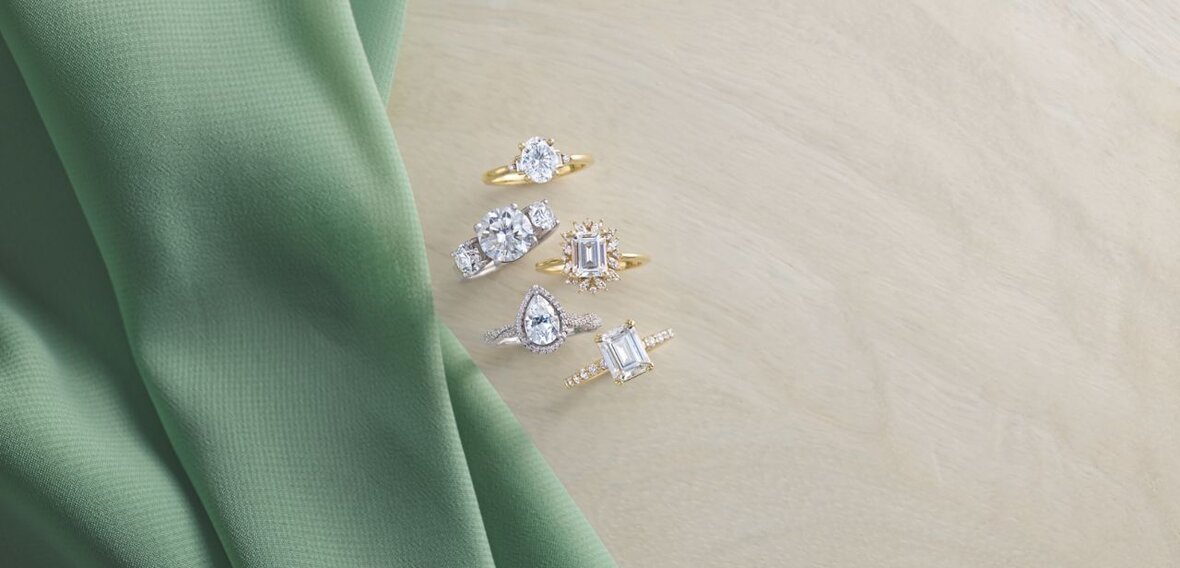 Elegant gold engagement ring with diamond pavé band stacked with matching wedding bands by Wedding Bands & Co., Chicago custom jeweler