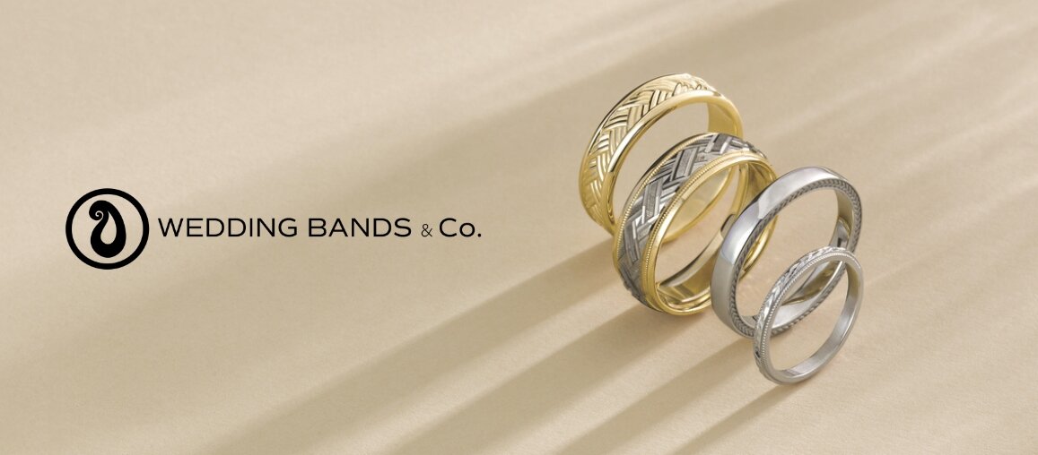 Collection of modern wedding bands in yellow gold, white gold, and platinum with textured designs by Wedding Bands & Co. in Chicago