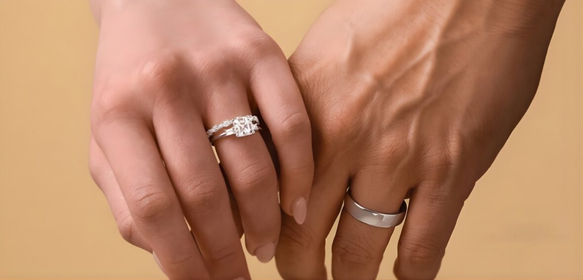 Gold engagement ring with pavé diamond band and wedding bands representing Victorian era ring traditions