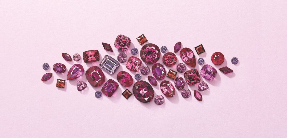 White and yellow gold diamond wedding bands styled on lace fabric, showcasing elegant bridal ring designs by Wedding Bands & Co. in Chicago