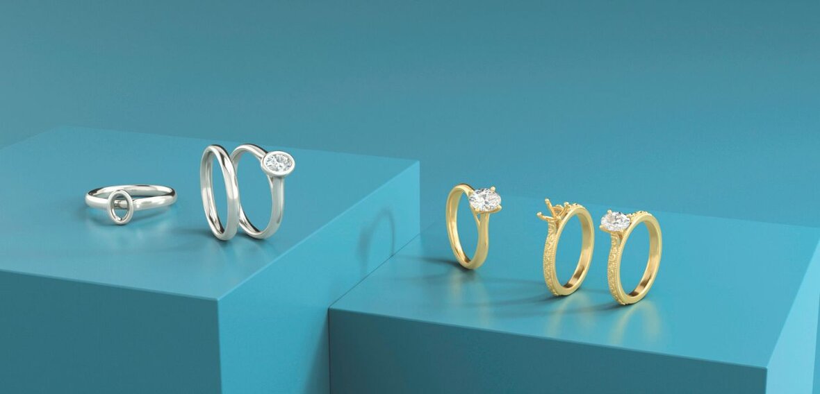 White and yellow gold diamond wedding bands styled on lace fabric, showcasing elegant bridal ring designs by Wedding Bands & Co. in Chicago