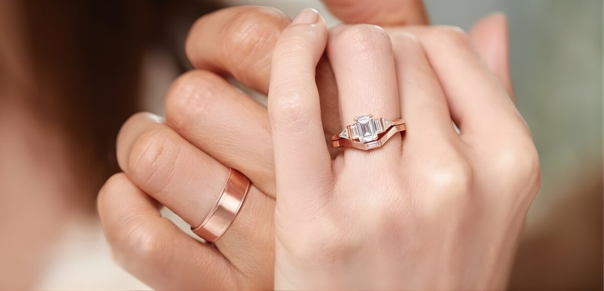 Collection of wedding bands in platinum, gold, and palladium showing different metal options and finishes