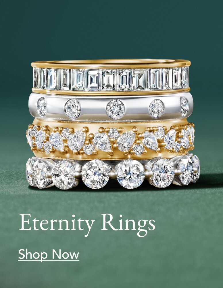 Stack of diamond eternity wedding rings.