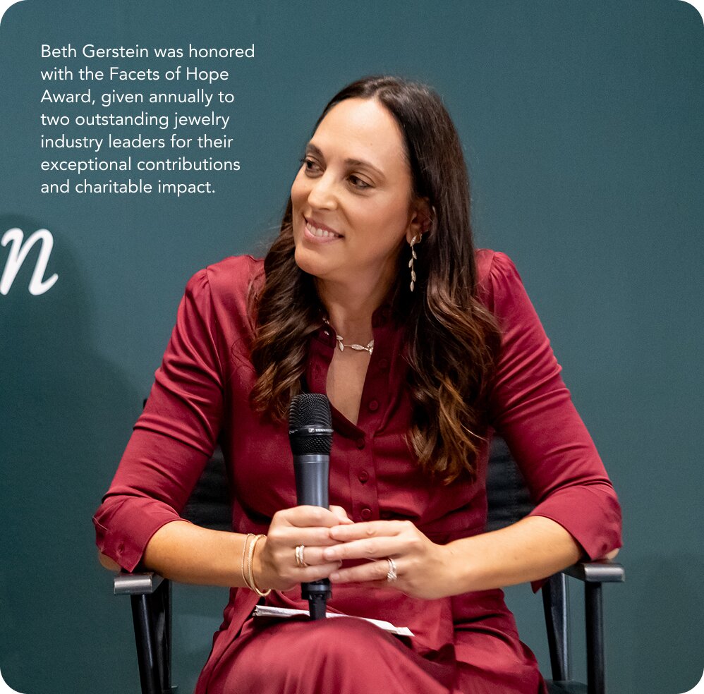Worker in orange safety vest tending to plants in outdoor setting