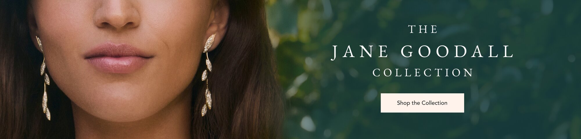 Model wearing diamond drop earrings from the Jane Goodall collection.