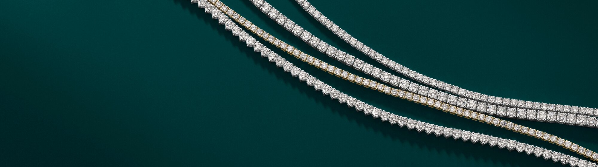 Geometric illustration of a diamond symbol in white against dark background