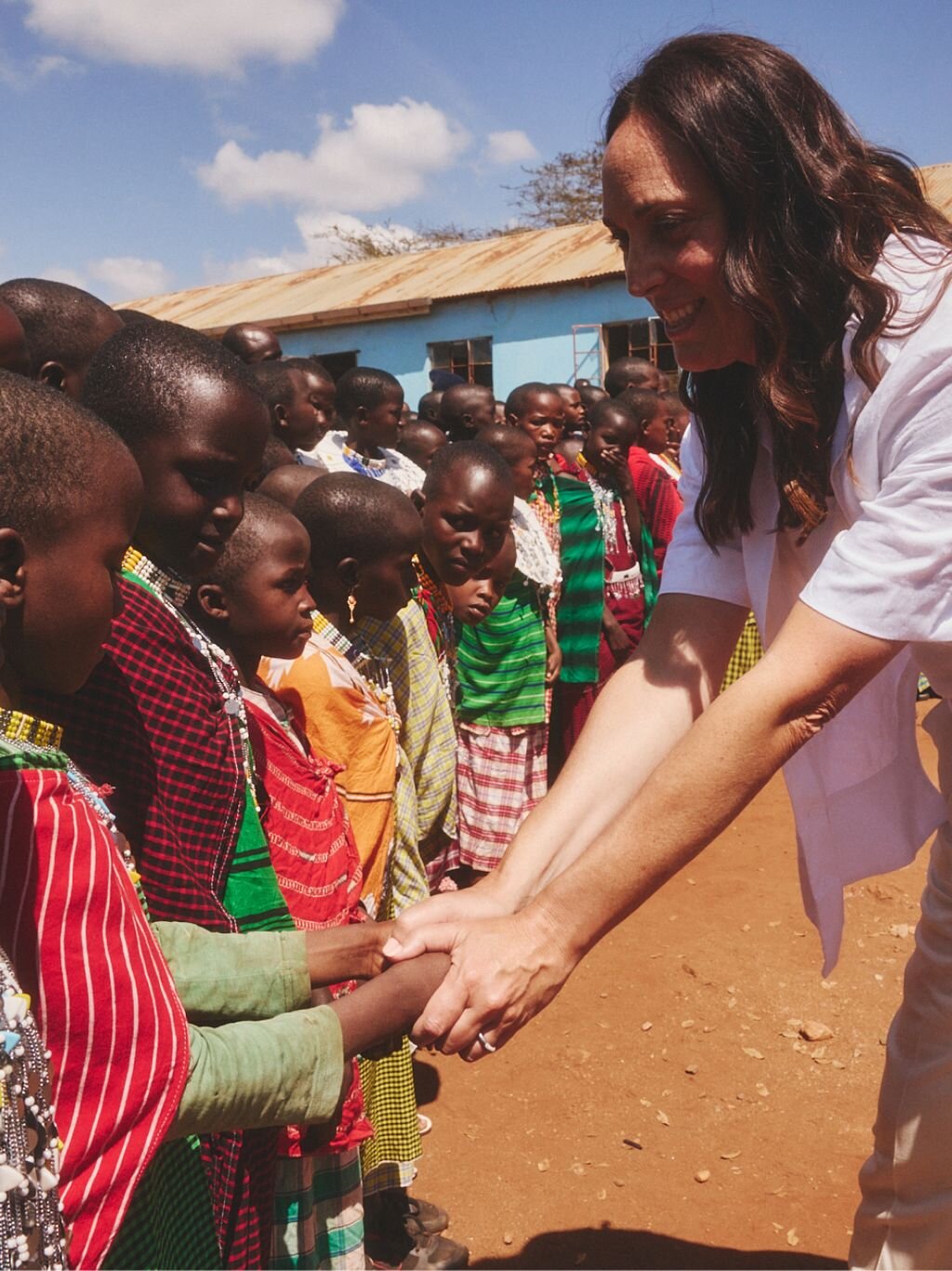 Brilliant Earth CEO Beth Gerstein interacting with a group of children