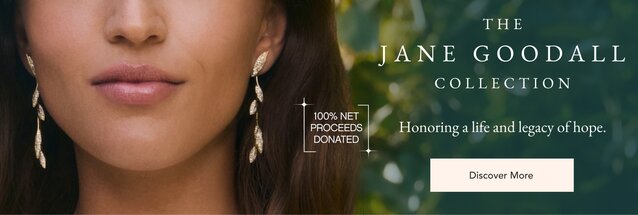 Model wearing diamond drop earrings from the Jane Goodall collection.
