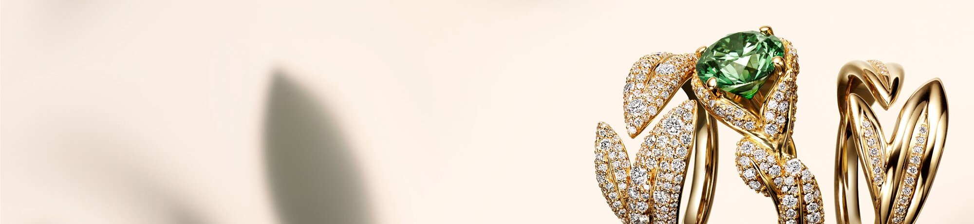 Landscape with lone tree against mountains under cloudy sky