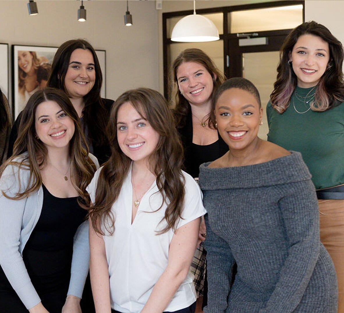 Group with raised hands at community gathering