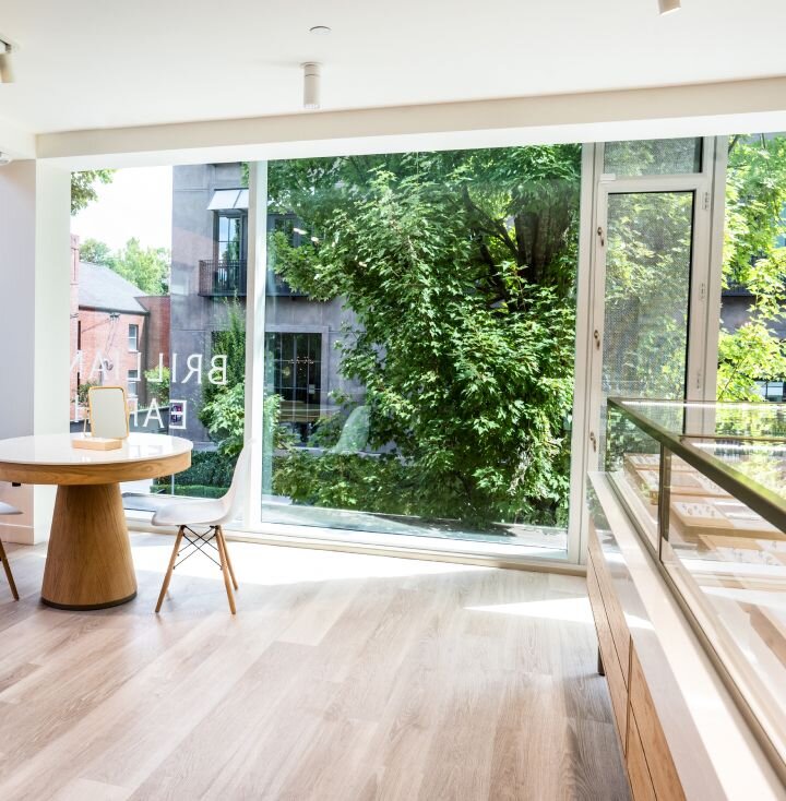 Modern Brilliant Earth store interior with large windows and natural light