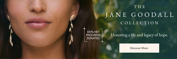 Model wearing diamond drop earrings from the Jane Goodall collection.