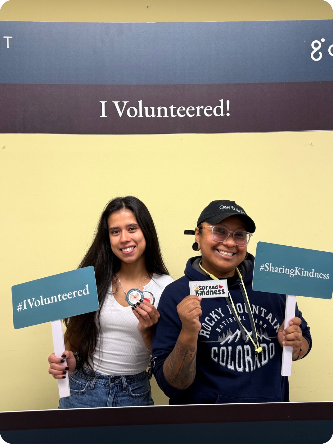 Two employees smiling