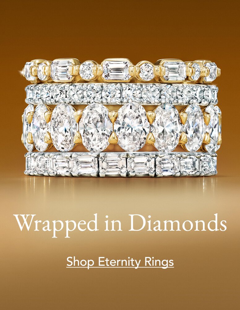 Stack of diamond eternity wedding rings.