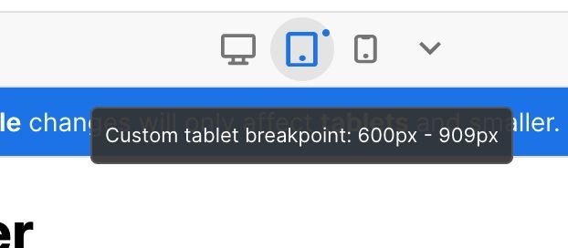 Screenshot fo small blue dot to the upper right of one of the breakpoints icons, which indicates a custom breakpoint applies to that range of viewport sizes.