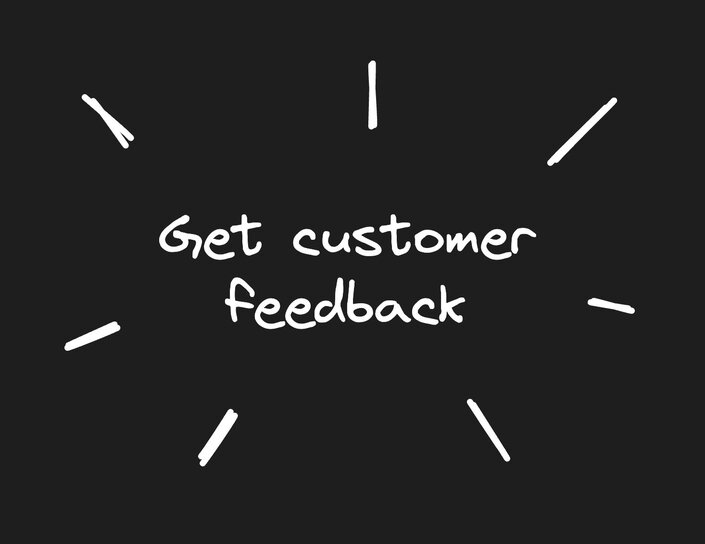 Image of the phrase, get customer feedback with lines, extending from it like radiating light.