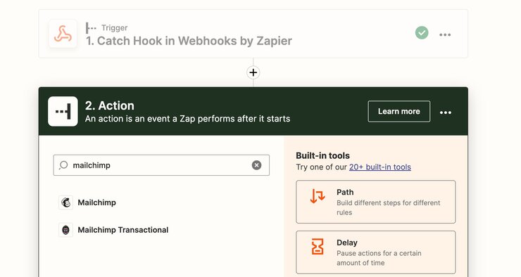 screenshot of Step 2 of create zap dialogue in Zapier with theAction step expanded and the search bar populated with the word Mailchimp.