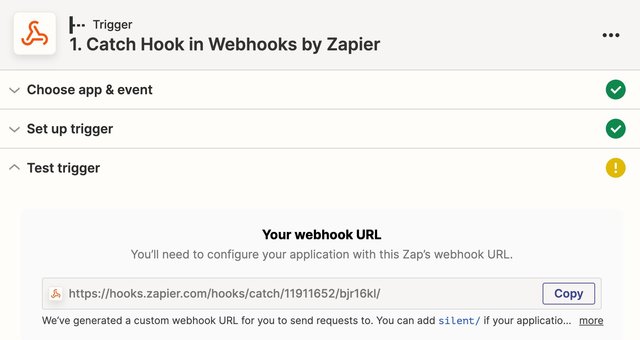 screenshot of create zap dialogue in Zapier with the Test Trigger section open, which displays a webhook URL that you can copy.