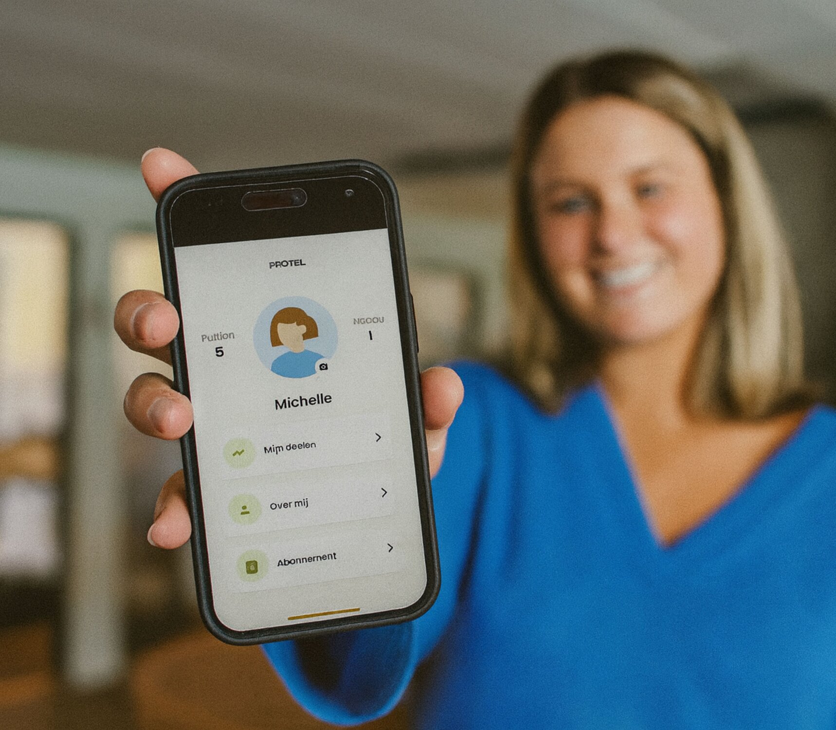 Image of woman holding with with baribuddy app showing 