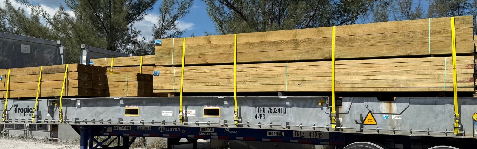 Worker installing roof sheet